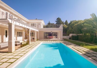Luxury los angeles home with custom swimming pool and stone/grass pavers